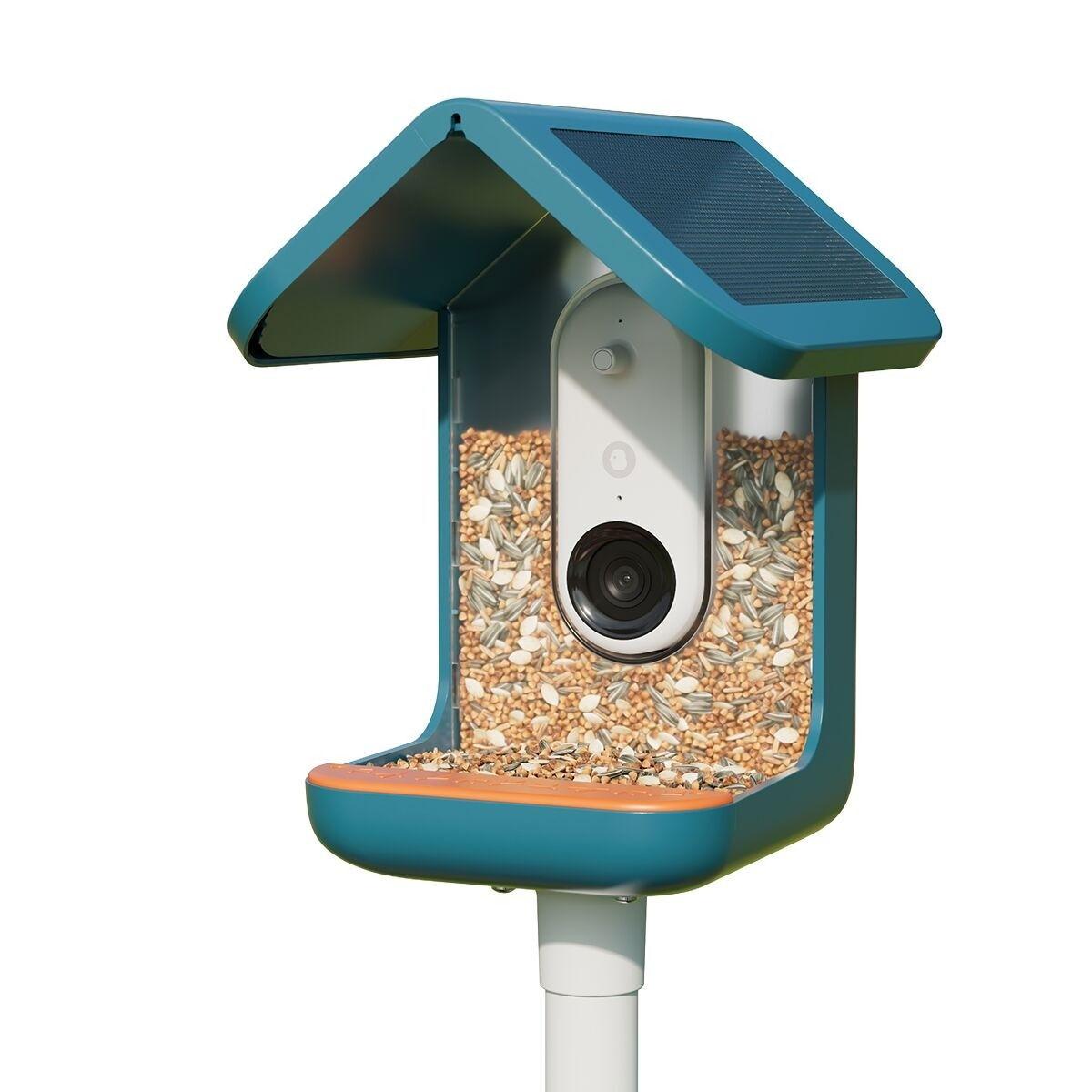 Bird Buddy fågelmatare med inbyggd kamera i blått, kopplad till mobilapp